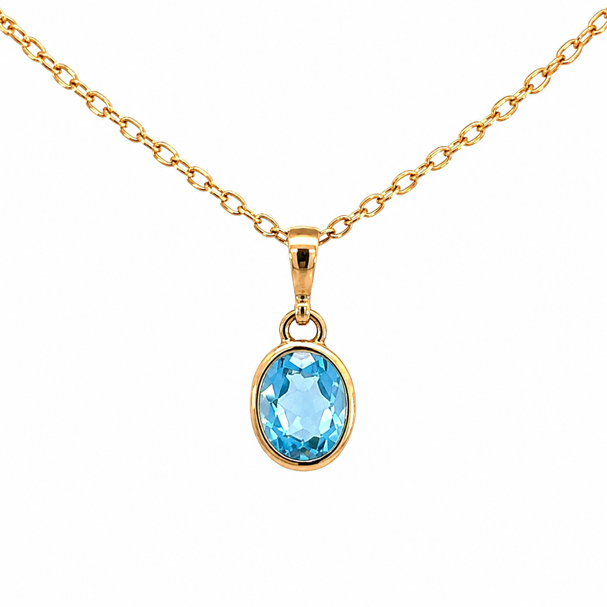 Yellow Gold & Blue Topaz Pendant